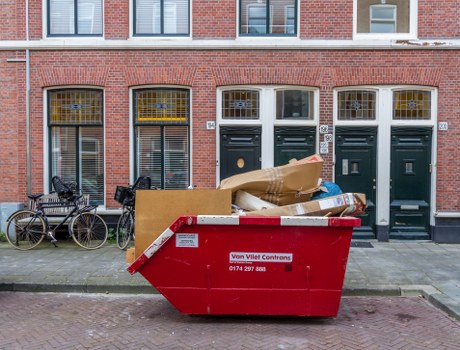 Construction site with waste materials being sorted for disposal