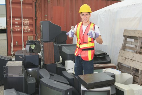Office furniture being removed by clearance services