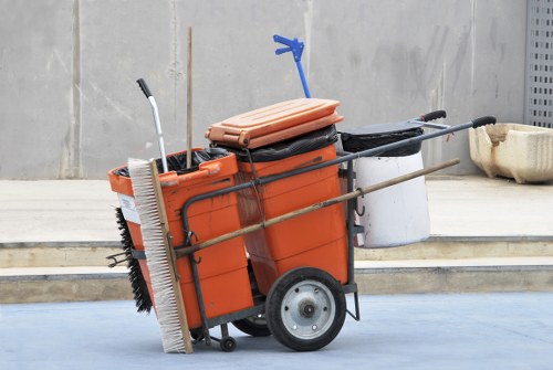 Operator wearing PPE while inspecting a skip