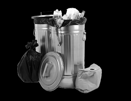 Workers handling construction waste responsibly